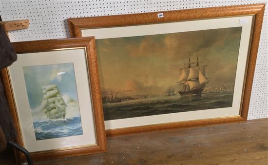 Two ship prints in maple frames